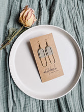 Load image into Gallery viewer, Clay Putty Leather & Brass Oval Accent Earrings