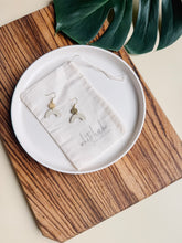 Load image into Gallery viewer, Smooth Cream Leather Arch and Tiny Brass Disc Earrings