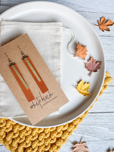 Load image into Gallery viewer, Burnt Orange Leather Earrings with Rectangle Brass Bar Accent