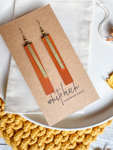 Load image into Gallery viewer, Burnt Orange Leather Earrings with Rectangle Brass Bar Accent