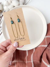 Load and play video in Gallery viewer, Distressed Teal Leather & Brass Oval Accent Earrings