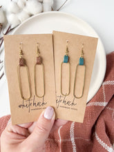 Load and play video in Gallery viewer, Distressed Teal Leather & Brass Oval Accent Earrings