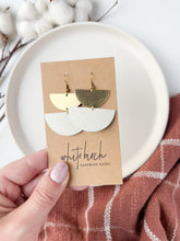 Load and play video in Gallery viewer, White Corn Leather & Brass Half Moon Stacked Dangle Earrings