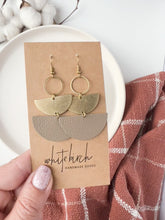 Load and play video in Gallery viewer, Taupe Leather & Brass Stacked Half Moon Dangle Earrings