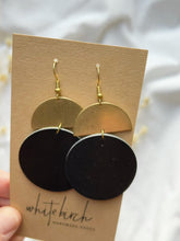 Load and play video in Gallery viewer, Black Leather Disc & Brass Half Moon Stacked Dangle Earrings