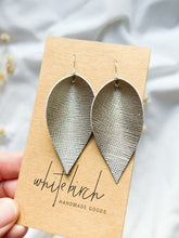 Load and play video in Gallery viewer, Platinum Embossed Metallic Leather Leaf Earrings