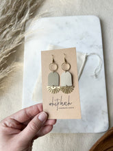 Load and play video in Gallery viewer, Clay Putty Tan Leather & Brass Sunburst Geometric Earrings