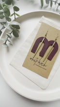 Load and play video in Gallery viewer, Burgundy Leather Arch & Brass Bar Geometric Earrings