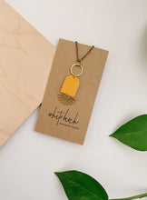 Load image into Gallery viewer, Brass Sunburst Mustard Yellow Leather Necklace