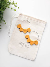 Load image into Gallery viewer, Mustard Yellow Leather Petal Hoop Earrings.