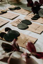 Load image into Gallery viewer, Black Leather Half Moon & Brass Circle Dangle Earrings.