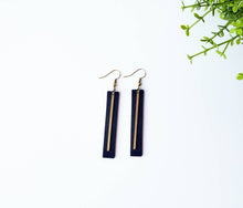 Load image into Gallery viewer, Black Leather Bar Earrings with a Thin Brass Bar Accent.