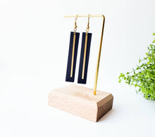 Load image into Gallery viewer, Black Leather Bar Earrings with a Thin Brass Bar Accent.