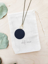 Load image into Gallery viewer, *SALE* Geometric Brass Hexagon Black Leather Circle Necklace