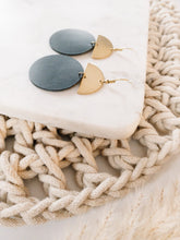 Load image into Gallery viewer, Black Leather Disc & Brass Half Moon Stacked Dangle Earrings.