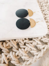 Load image into Gallery viewer, Black Leather Disc & Brass Half Moon Stacked Dangle Earrings.