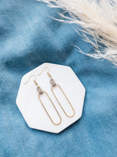 Load image into Gallery viewer, Latte brown leather earrings with a long brass oval
