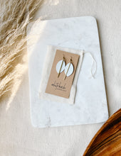 Load image into Gallery viewer, Petal Shape White Saffiano Lux Leather & Brass Bar Statement Geometric Earrings