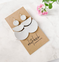 Load image into Gallery viewer, modern half circle earrings in a glossy white leather