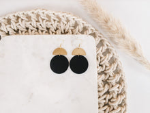 Load image into Gallery viewer, Black Leather Disc & Brass Half Moon Stacked Dangle Earrings.