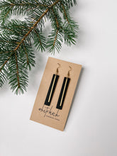 Load image into Gallery viewer, Black Leather Bar Earrings with a Thin Brass Bar Accent.
