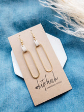 Load image into Gallery viewer, Cream Leather & Brass Oval Accent Earrings