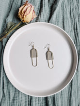 Load image into Gallery viewer, Clay Putty Leather &amp; Brass Oval Accent Earrings
