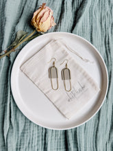 Load image into Gallery viewer, Clay Putty Leather &amp; Brass Oval Accent Earrings
