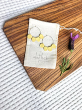 Load image into Gallery viewer, Butter Yellow Leather Petal Hoop Earrings
