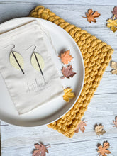 Load image into Gallery viewer, Butter Yellow Leather Petal and Silver Bar Earrings
