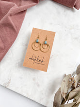 Load image into Gallery viewer, Blue Leather Oval &amp; Double Brass Circles Earrings

