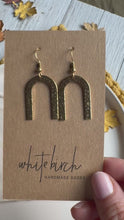 Load and play video in Gallery viewer, Hammered Brass Bold Horseshoe Earrings
