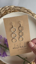 Load and play video in Gallery viewer, Silver Triple Hexagon Dangle Earrings
