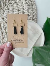Load and play video in Gallery viewer, Mini Black Leather Tassel &amp; Brass Circle Earrings
