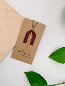  Burgundy Leather Arch Brass Accent Necklace