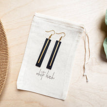 Load image into Gallery viewer, Black Leather Rectangular Bar Earrings with a Brass Bar Accent
