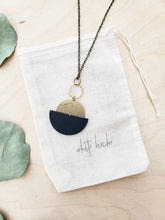 Load image into Gallery viewer, Geometric Brass and Black Leather Half Moon Necklace
