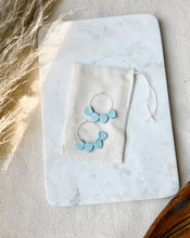 Load image into Gallery viewer, Light Blue Leather Petal Hoop Earrings
