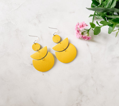 bright yellow stacked half moon and moon shape leather earrings