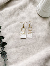 Load image into Gallery viewer, White and Gold Fleck Leather with Brass Circle Earrings
