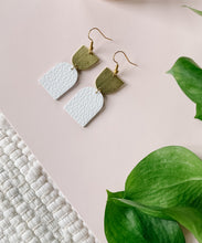 Load image into Gallery viewer, White Leather with Oblong Brass Accent Earrings

