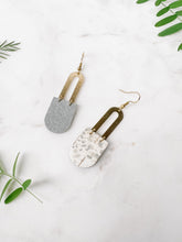 Load image into Gallery viewer, Spotted White Grey Cork Leather &amp; Brass Earrings
