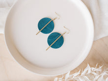 Load image into Gallery viewer, Ocean Blue Teal Leather Disc and Brass Bar Earrings
