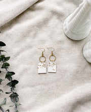 Load image into Gallery viewer, White and Gold Fleck Leather with Brass Circle Earrings 
